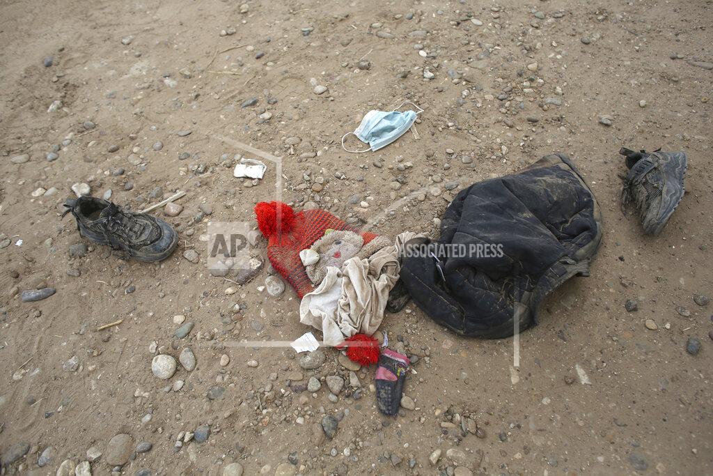Dario Lopez-Mills Personal items lie on the ground that were left behind by migrants who had crossed the Rio Grande river into the United States and taken into custody of the Border Patrol in Eagle Pass, Texas, Friday, May 20, 2022. As U.S. officials anxiously waited, many of the migrants crossing the border from Mexico on Friday were oblivious to a pending momentous court ruling on whether to maintain pandemic-related powers that deny a chance to seek asylum on grounds of preventing the spread of COVID-19. (AP Photo/Dario Lopez-Mills)