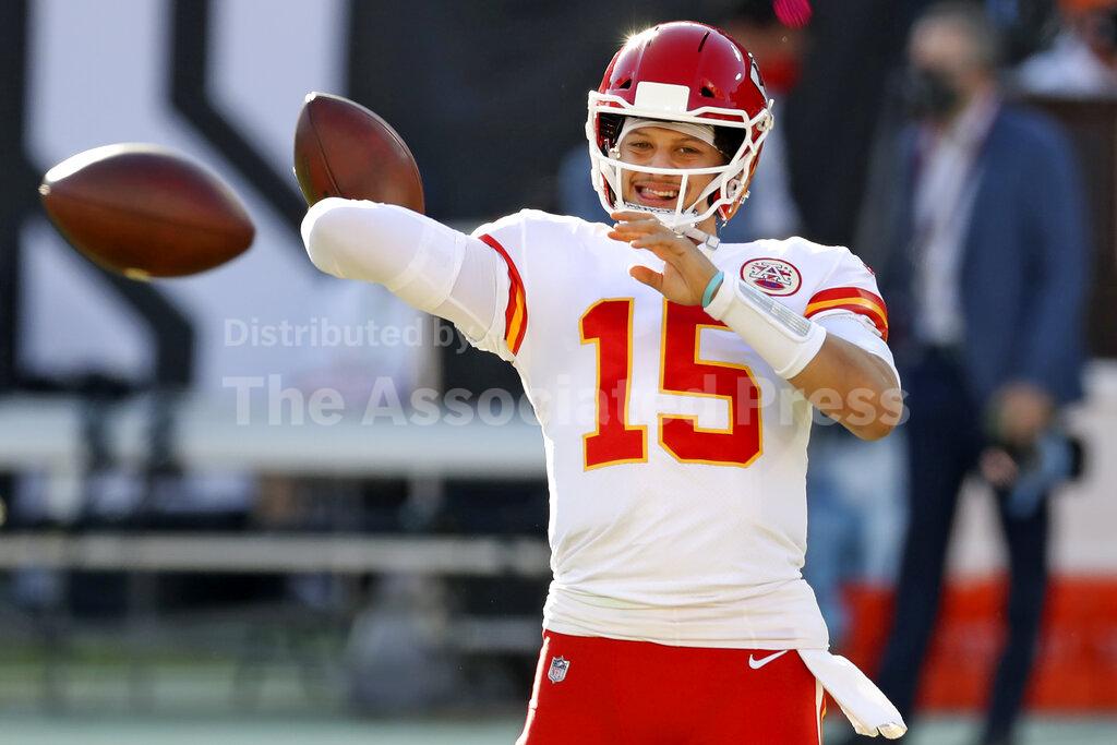 Kansas City Chiefs quarterback Patrick Mahomes (15) throws a pass before an NFL football game against the Tampa Bay Buccaneers Sunday, Nov. 29, 2020, in Tampa, Fla. (AP Photo/Mark LoMoglio)