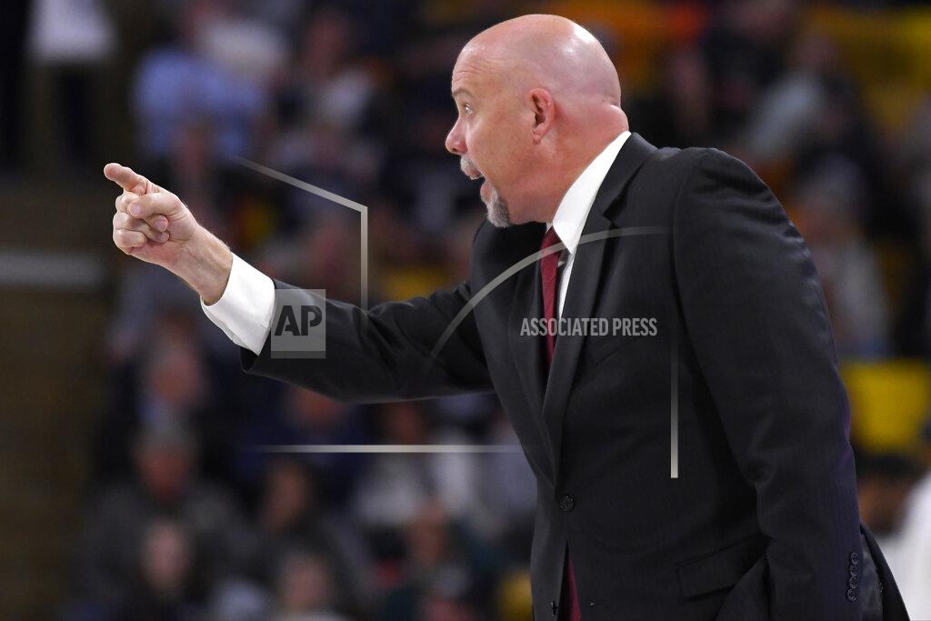 Eli Lucero UTSA head coach Steve Henson talks to his team as they play Utah State in the first half of an NCAA college basketball game Monday, Nov. 18, 2019, in Logan, Utah. (AP Photo/Eli Lucero)