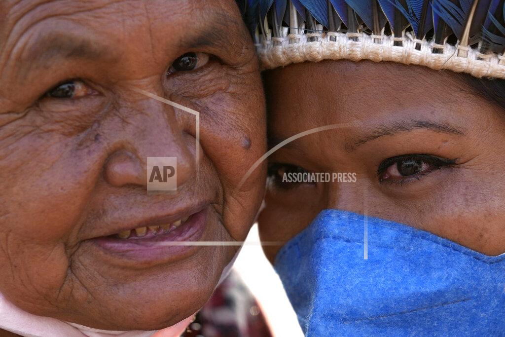 Eraldo Peres Indigenous women react after the Supreme Court judges' decision to suspend the vote that defines the demarcation of Indigenous lands, during a protest in front of the Supreme Court building, in Brasilia, Brazil, Wednesday, Sept. 15, 2021. (AP Photo/Eraldo Peres)