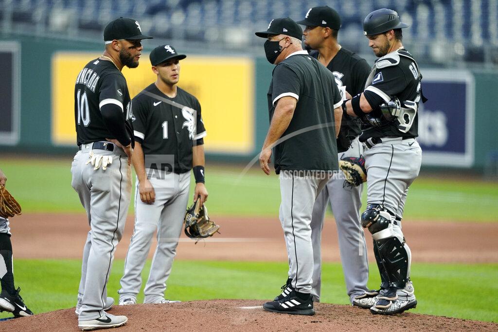 Charlie Riedel Chicago White Sox manager Rick Renteria talks to his players during a pitching change in the fourth inning of the team's baseball game against the Kansas City Royals on Saturday, Aug. 1, 2020, in Kansas City, Mo. (AP Photo/Charlie Riedel)