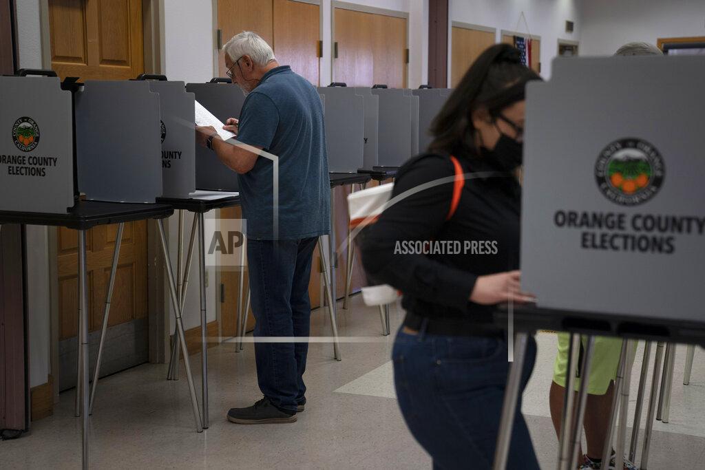 Jae C. Hong FILE — In this Sept. 14, 2021 file photo voters cast their ballots at a voting center in the Orange County city of La Habra, Calif. California Republicans needed a heroic turnout in Tuesday's recall election to have any chance of ousting Democratic Gov. Gavin Newsom, but preliminary vote tallies, Friday Sept. 17, 2021, show overall turnout was around 55%, far below the 80% that voted in the 2020 presidential contest. (AP Photo/Jae C. Hong, File)