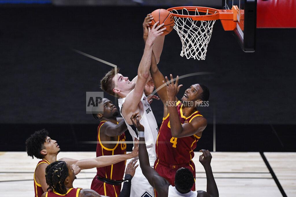 Jessica Hill BYU's Matt Haarms, top left, and Southern California's Evan Mobley, top right, fight for a rebound in the second half of an NCAA college basketball game, Tuesday, Dec. 1, 2020, in Uncasville, Conn. (AP Photo/Jessica Hill)
