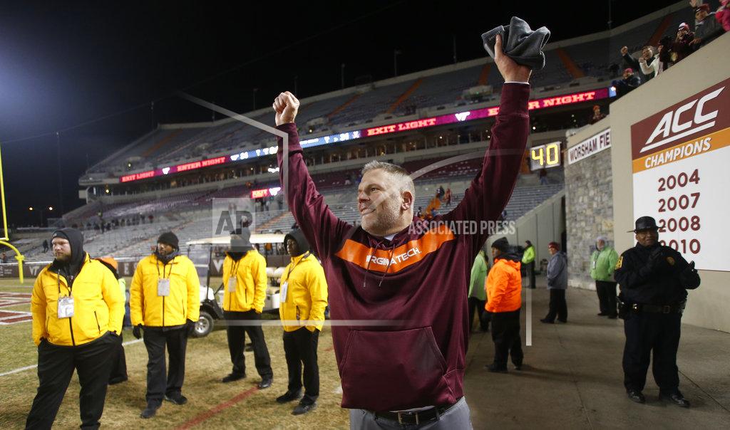 Steve Helber Virginia Tech head coach Justin Fuente celebrates his team's win over Virginia after an NCAA college football game in Blacksburg, Va., Friday, Nov. 23, 2018. Virginia Tech defeated Virginia 34-31. (AP Photo/Steve Helber)