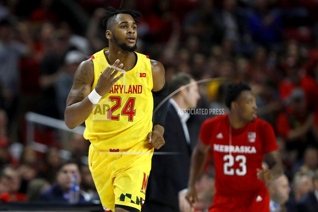 Julio Cortez Maryland forward Donta Scott gestures after scoring a basket on Nebraska during the first half of an NCAA college basketball game, Tuesday, Feb. 11, 2020, in College Park, Md. (AP Photo/Julio Cortez)