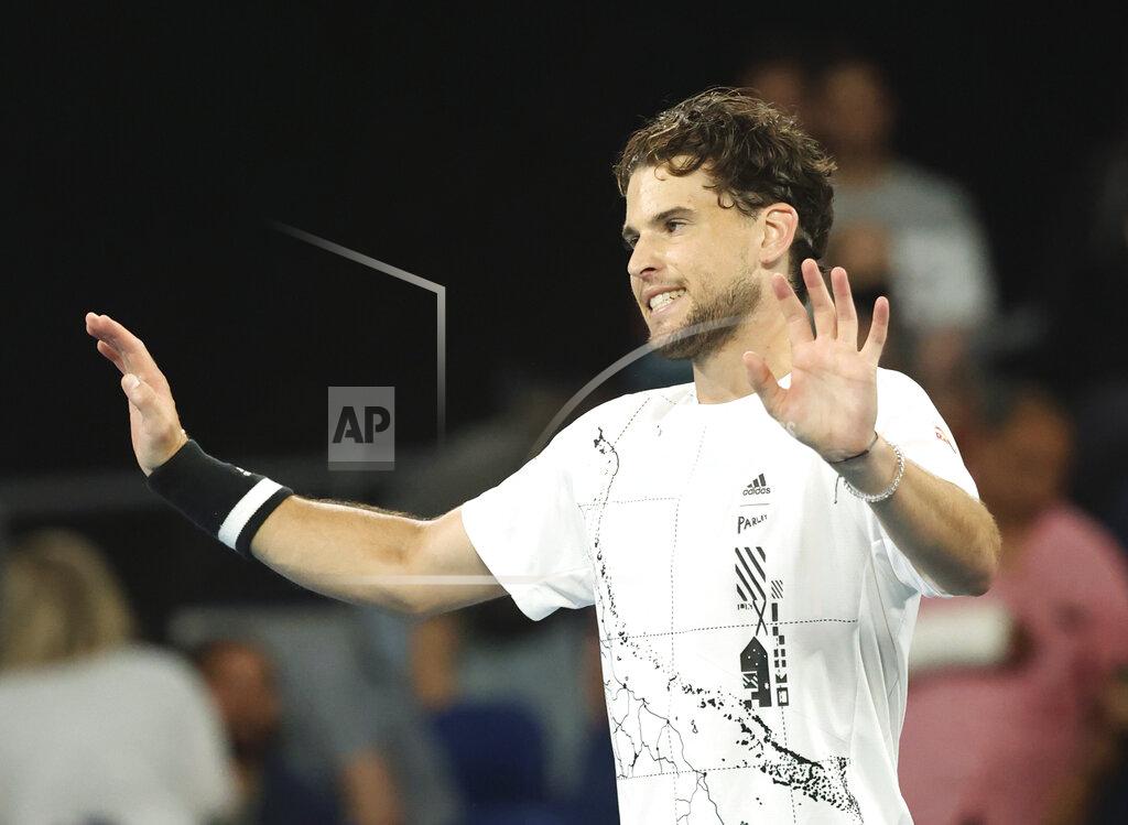 Hamish Blair Austria's Dominic Thiem celebrates after winning his third round match against Australia's Nick Kyrgios at the Australian Open tennis championship in Melbourne, Australia, Friday, Feb. 12, 2021.(AP Photo/Hamish Blair)