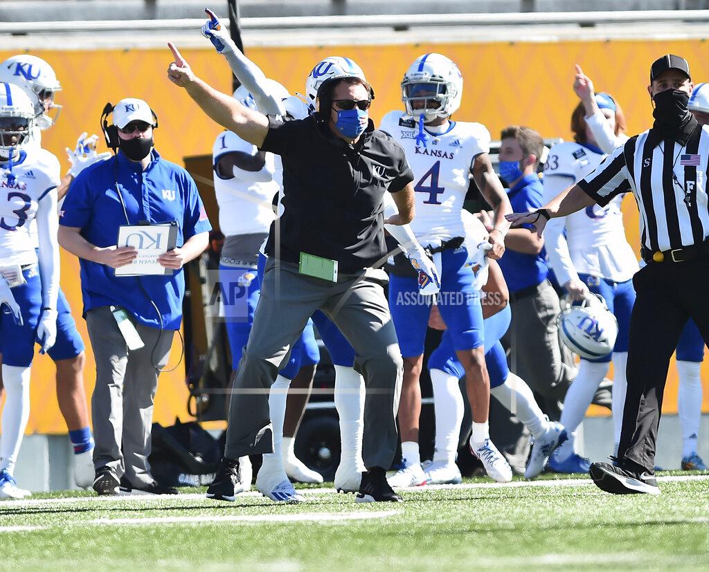 William Wotring Kansas acting head coach Joshua Eargle reacts to a play against West Virginia during an NCAA college football game, Saturday, Oct. 17, 2020, in Morgantown, W.Va. (William Wotring/The Dominion-Post via AP)