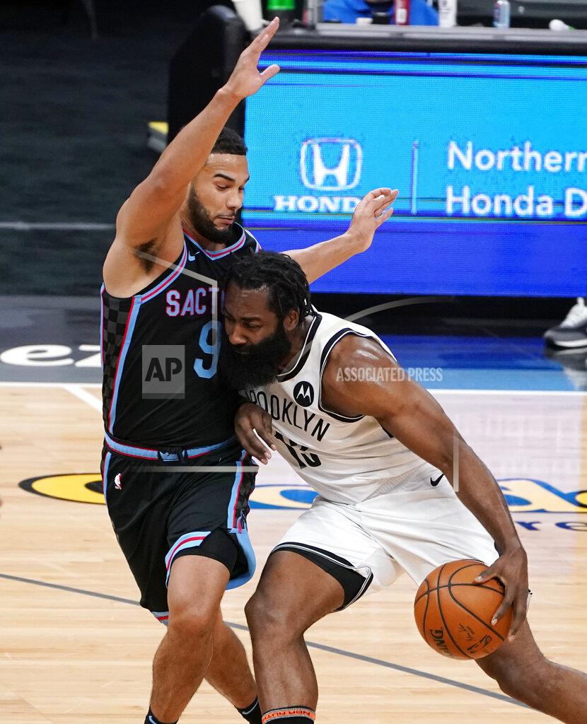 Rich Pedroncelli Sacramento Kings guard Cory Joseph, left, tries to stop the drive Brooklyn Nets guard James Harden during the first half of an NBA basketball game in Sacramento, Calif., Monday, Feb. 15, 2021. (AP Photo/Rich Pedroncelli)