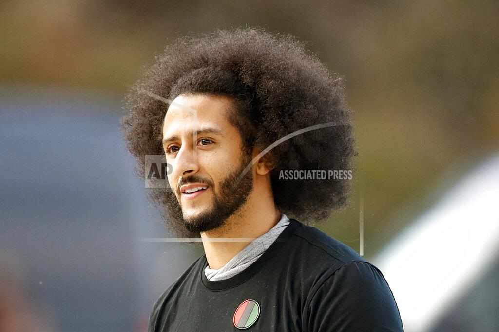 Todd Kirkland FILE - In this Nov. 16, 2019, file photo, free agent quarterback Colin Kaepernick arrives for a workout for NFL football scouts and media in Riverdale, Ga. Kaepernick has been a leader in the fight for social justice by people of color not just in the football world or the sports world. Recent developments have raised his profile and, more significantly, reminded many of the sacrifices he has made while protesting social injustice and police brutality.(AP Photo/Todd Kirkland, File)