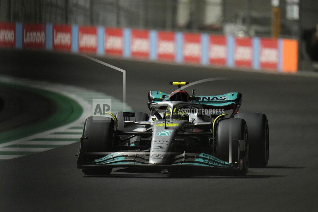 Hassan Ammar Mercedes driver Lewis Hamilton of Britain steers his car during the Formula One Grand Prix it in Jiddah, Saudi Arabia, Sunday, March 27, 2022. (AP Photo/Hassan Ammar)