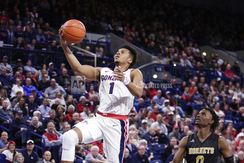 Young Kwak Gonzaga guard Admon Gilder (1) shoots in front of Alabama State guard DJ Heath (0) during the second half of an NCAA college basketball game in Spokane, Wash., Tuesday, Nov. 5, 2019. Gonzaga won 95-64. (AP Photo/Young Kwak)