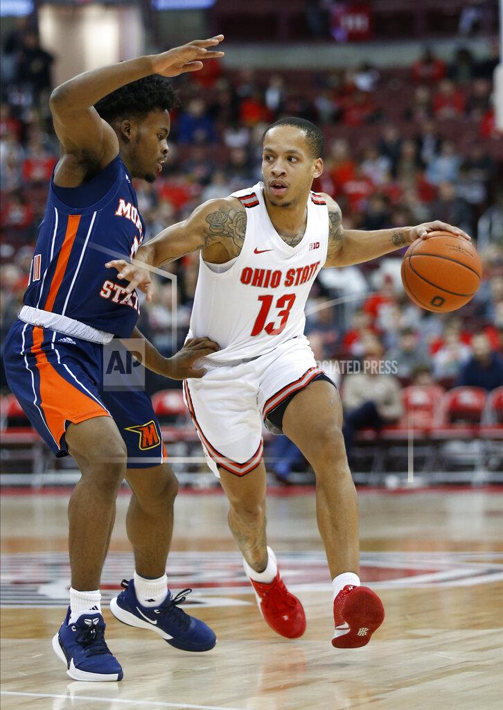 Jay Laprete Ohio State's C.J. Walker, right, looks for an open pass as Morgan State's Sherwyn Devonish defends during the second half of an NCAA college basketball game Friday, Nov. 29, 2019, in Columbus, Ohio. Ohio State beat Morgan State 90-57. (AP Photo/Jay LaPrete)