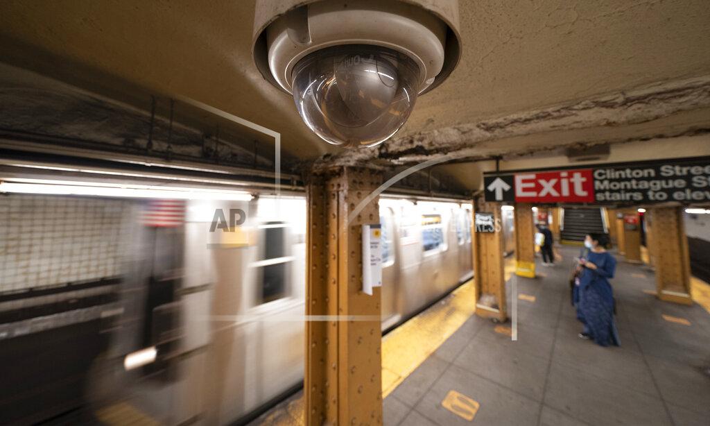 Mark Lennihan FILE - In this Oct. 7, 2020, file photo, video surveillance camera is installed on the ceiling above a subway platform in the Court Street station in the Brooklyn borough of New York. State lawmakers across the U.S. are reconsidering the tradeoffs of facial recognition technology amid civil rights and racial bias concerns. (AP Photo/Mark Lennihan, File)