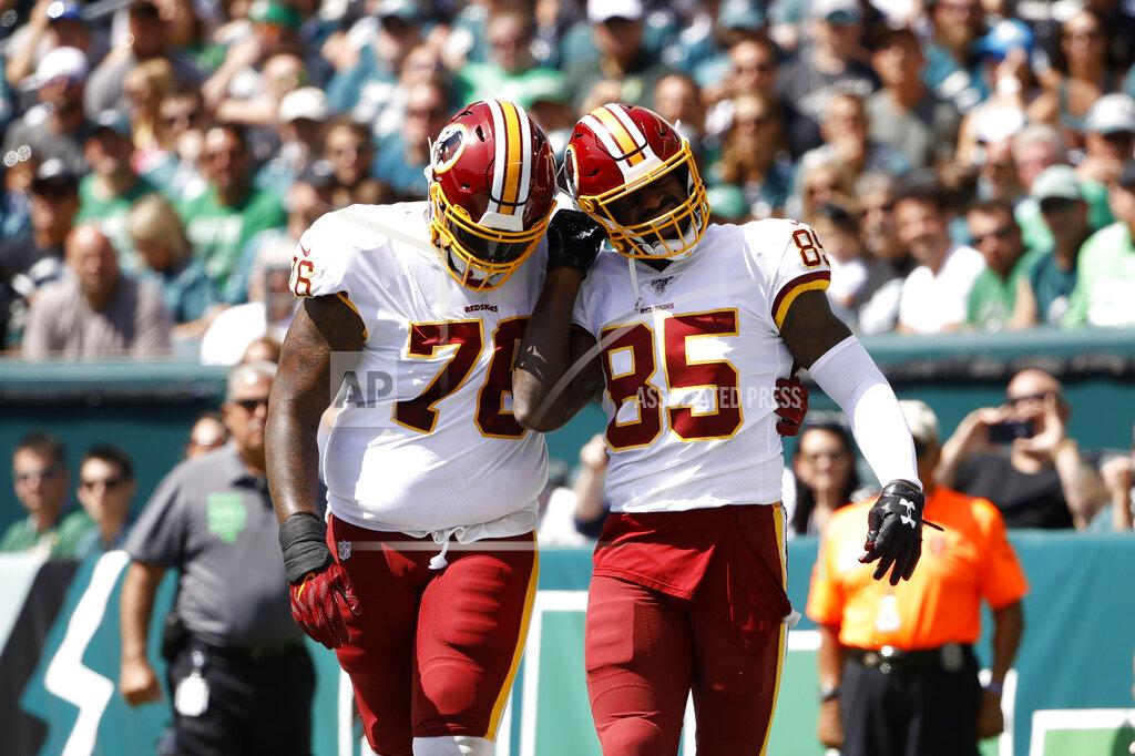 Matt Rourke Washington Redskins' Vernon Davis, right, and Morgan Moses celebrate after Davis' touchdown during the first half of an NFL football game against the Philadelphia Eagles, Sunday, Sept. 8, 2019, in Philadelphia. (AP Photo/Matt Rourke)