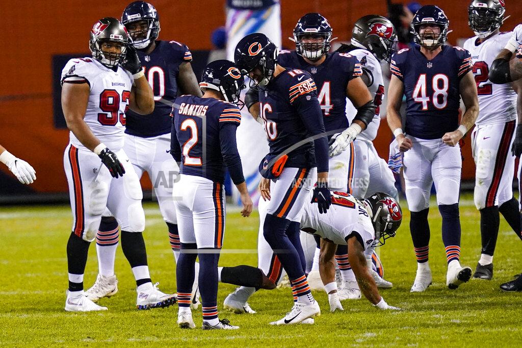 Charles Rex Arbogast Chicago Bears' Cairo Santos (2) celebrates a go-ahead field goal with holder Pat O'Donnell (16) during the second half of the team's NFL football game against the Tampa Bay Buccaneers in Chicago, Thursday, Oct. 8, 2020. The Bears won 20-19. (AP Photo/Charles Rex Arbogast)