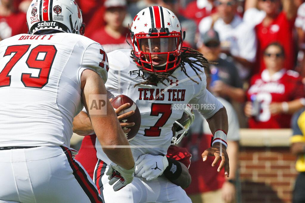 Sue Ogrocki Texas Tech quarterback Jett Duffey (7) is brought down from behind by Oklahoma linebacker Kenneth Murray (9) in the first quarter of an NCAA college football game in Norman, Okla., Saturday, Sept. 28, 2019. (AP Photo/Sue Ogrocki)