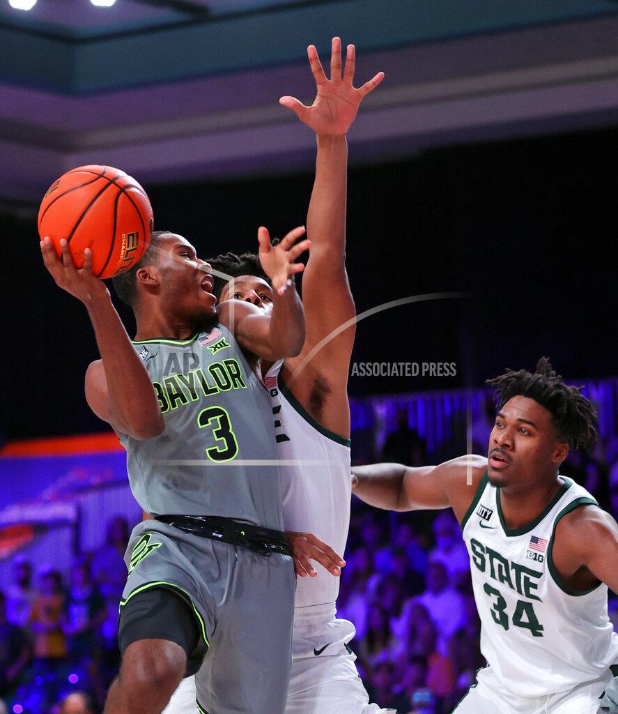 Tim Aylen In this photo provided by Bahamas Visual Services, Baylor guard Dale Bonner (3) looks to shoot against Michigan State during an NCAA college basketball game at Paradise Island, Bahamas, Friday, Nov. 26, 2021. (Tim Aylen/Bahamas Visual Services via AP)