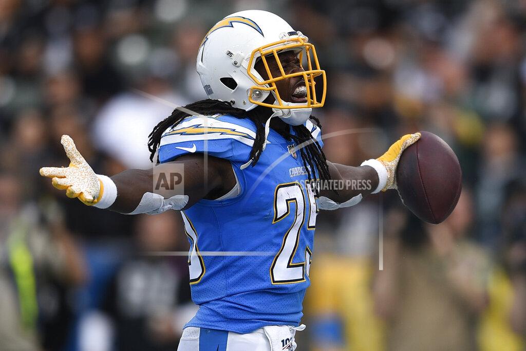 Kelvin Kuo Los Angeles Chargers running back Melvin Gordon celebrates after scoring during the first half of an NFL football game against the Oakland Raiders Sunday, Dec. 22, 2019, in Carson, Calif. (AP Photo/Kelvin Kuo)