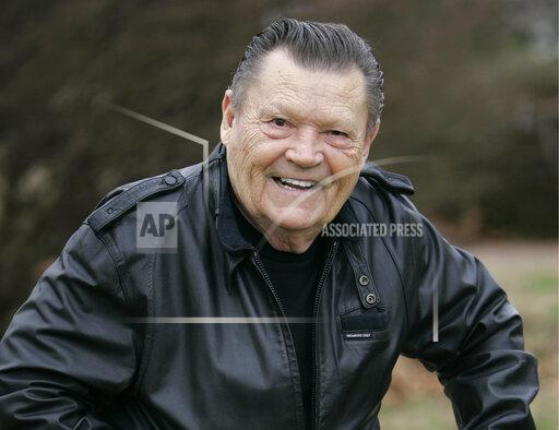 FILE - Grand Ole Opry singer Stonewall Jackson smiles in Nashville, Tenn., on Jan. 11, 2007. Jackson, who sang on the Grand Ole Opry for more than 50 years and had No. 1 hits with "Waterloo" and others, died Saturday, Dec. 4, 2021, after a long battle with vascular dementia. He was 89. (AP Photo/Mark Humphrey, File)