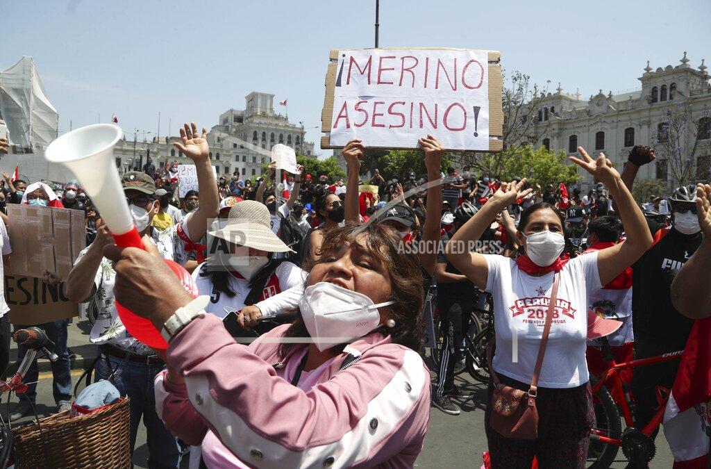 Martin Mejia People celebrate after the resignation of interim president Manuel Merino, at Plaza San Martin in Lima, Peru, Sunday, Nov. 15, 2020. Merino resigned after a violent crackdown on protests that left at least two people dead followed by an exodus of his cabinet members. (AP Photo/Martin Mejia)