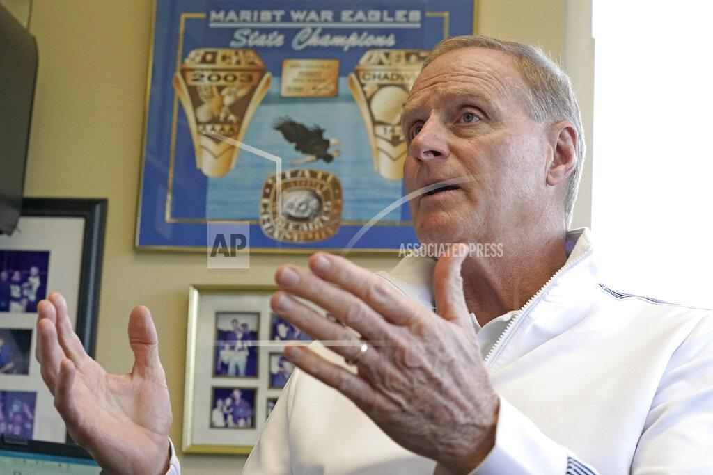 David J. Phillip Marist School football coach Alan Chadwick talks about Los Angeles Rams coach Sean McVay's high school career at Marist during an interview for the NFL Super Bowl 53 football game Friday, Feb. 1, 2019, in Atlanta. McVay was the starting quarterback his senior year at Marist when the team won the state championship in 2003. (AP Photo/David J. Phillip)