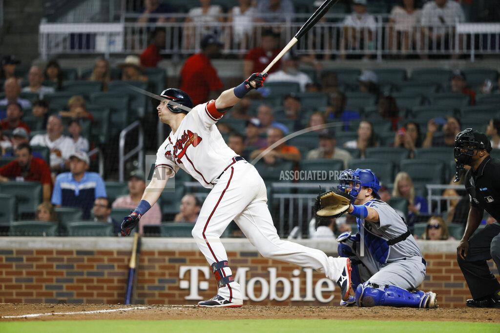 Bob Andres Atlanta Braves' Austin Riley hits an RBI single, scoring Michael Harris II during the seventh inning of a baseball game won by the Los Angeles Dodgers 5-3 on Sunday, June 26, 2022, in Atlanta. (AP Photo/Bob Andres)