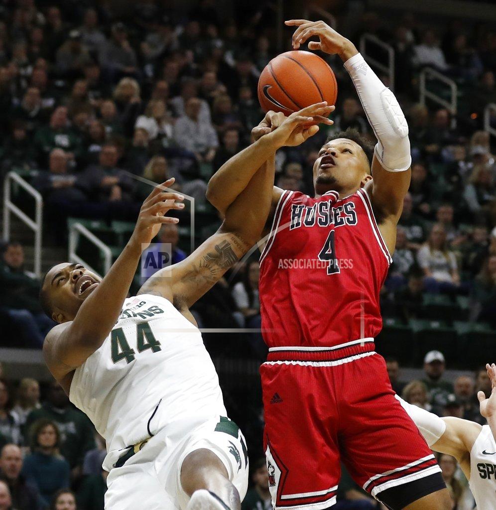 Carlos Osorio Michigan State forward Nick Ward (44) and Northern Illinois forward Lacey James (4) fight for the rebound during the first half of an NCAA college basketball game, Saturday, Dec. 29, 2018, in East Lansing, Mich. (AP Photo/Carlos Osorio)