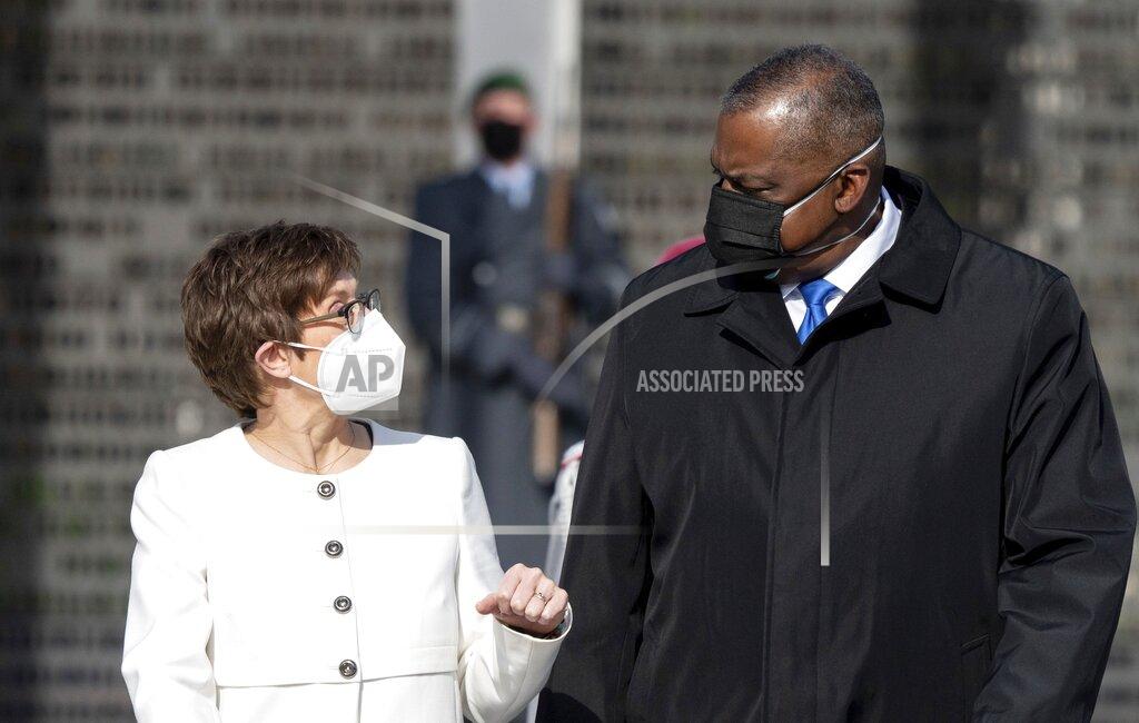 Kay Nietfeld Annegret Kramp-Karrenbauer, Federal Minister of Defence, receives US Secretary of Defence Lloyd Austin at the Federal Ministry of Defence in Berlin, Germany, Tuesday, April 13, 2021. This is the first visit to Germany by a minister of the new US administration. Austin will then travel on to Stuttgart, where he will talk to soldiers at the US command centres for troops in Africa and Europe. (Kay Nietfeld/dpa via AP)