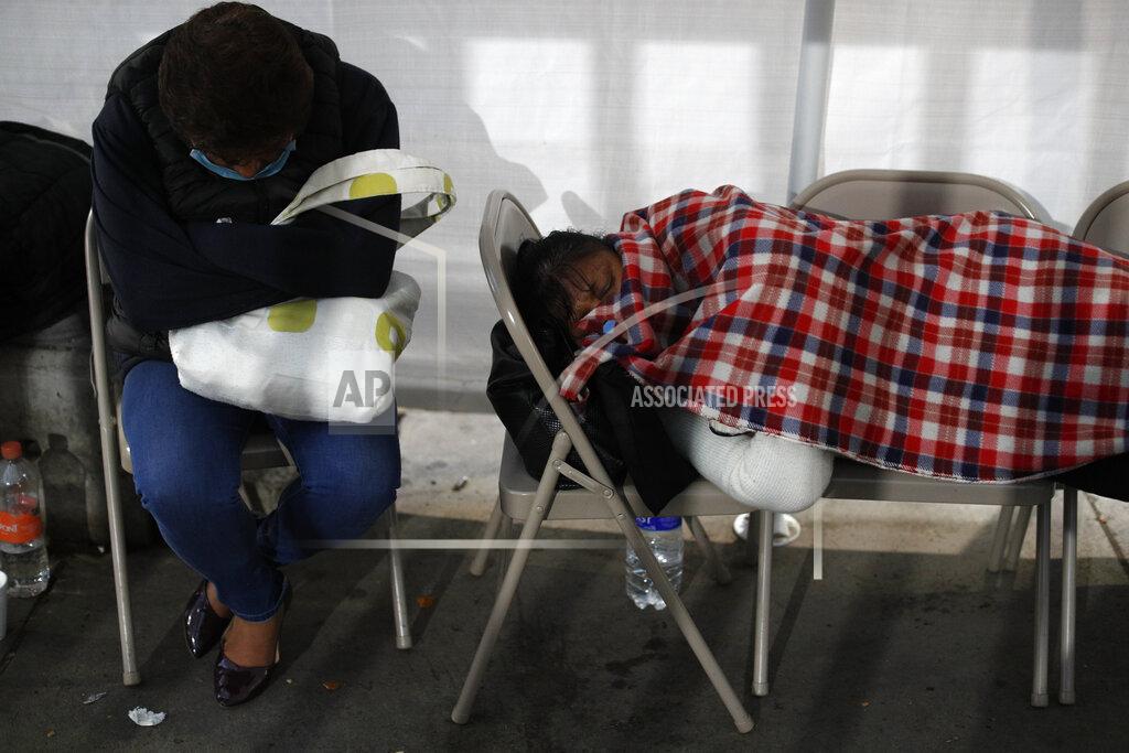 Rebecca Blackwell People sleep in chairs under a tarp set up on the sidewalk outside a public hospital where they wait for news of their hospitalized loved ones in the Iztapalapa district of Mexico City, early Thursday, May 7, 2020. Iztapalapa has the most confirmed cases of the new coronavirus within Mexico's densely populated capital, itself one of the hardest hit areas of the country with thousands of confirmed cases and more than 600 deaths. (AP Photo/Rebecca Blackwell)