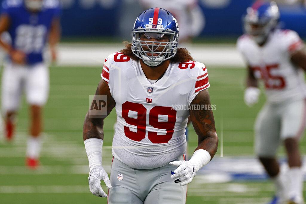 Adam Hunger New York Giants defensive end Leonard Williams (99) stretches prior to a scrimmage at the NFL football team's training camp in East Rutherford, N.J., Friday, Aug. 28, 2020. (AP Photo/Adam Hunger)