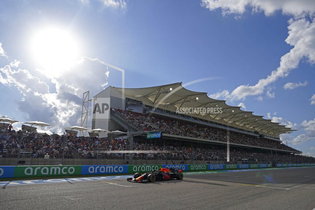 Darron Cummings Red Bull driver Sergio Perez, of Mexico, drives down the main straightaway during qualifications for the F1 U.S. Grand Prix auto race at the Circuit of the Americas, Saturday, Oct. 23, 2021, in Austin, Texas. (AP Photo/Darron Cummings, Pool)