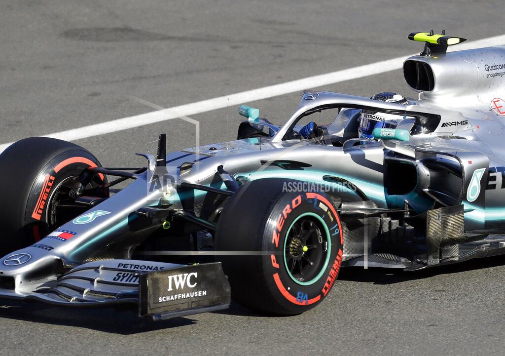 Sergei Grits Mercedes driver Valtteri Bottas of Finland steers his car during qualifying session at the Baku Formula One city circuit in Baku, Azerbaijan, Saturday, April 27, 2019. The Azerbaijan F1 Grand Prix race will be held on Sunday. (AP Photo/Sergei Grits)