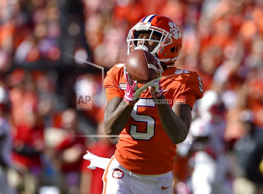 Richard Shiro Clemson's Tee Higgins catches a pass for a touchdown during the first half of an NCAA college football game against North Carolina State, Saturday, Oct. 20, 2018, in Clemson, S.C. (AP Photo/Richard Shiro)