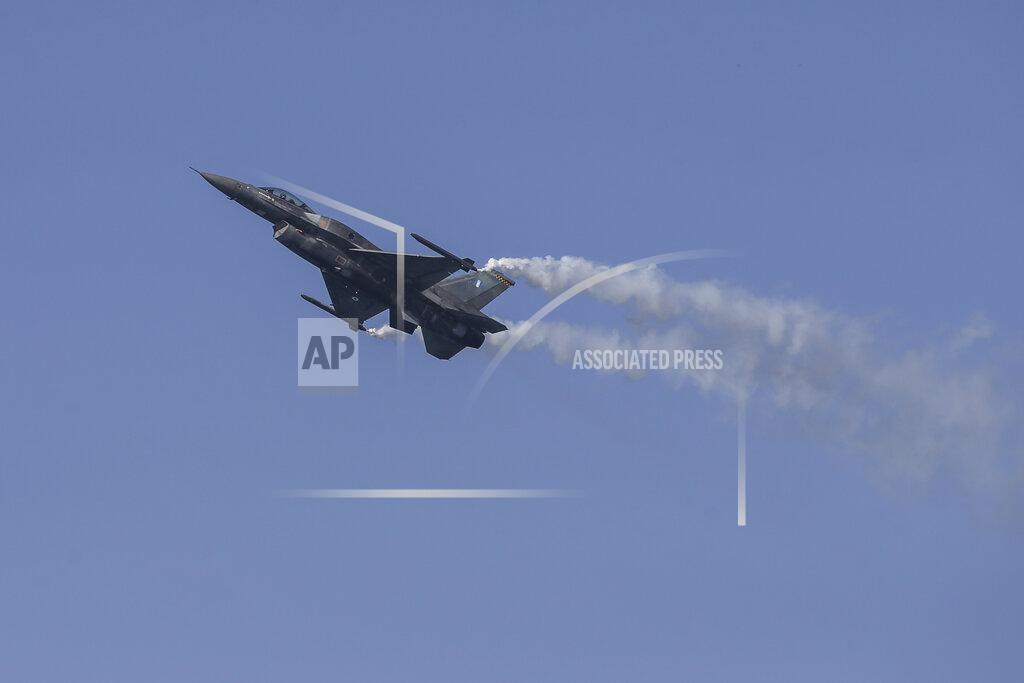Giannis Papanikos A Hellenic Air Force F-16 takes part at the annual military parade at the northern port city of Thessaloniki, Greece, on Thursday, Oct. 28, 2021 .The parade is held to celebrate Greece's refusal to align itself with a belligerent fascist Italy in 1940 and instead fight a much stronger opponent, a decision which dragged it into World War II and eventually led to a brutal occupation by Nazi Germany. (AP Photo/Giannis Papanikos)