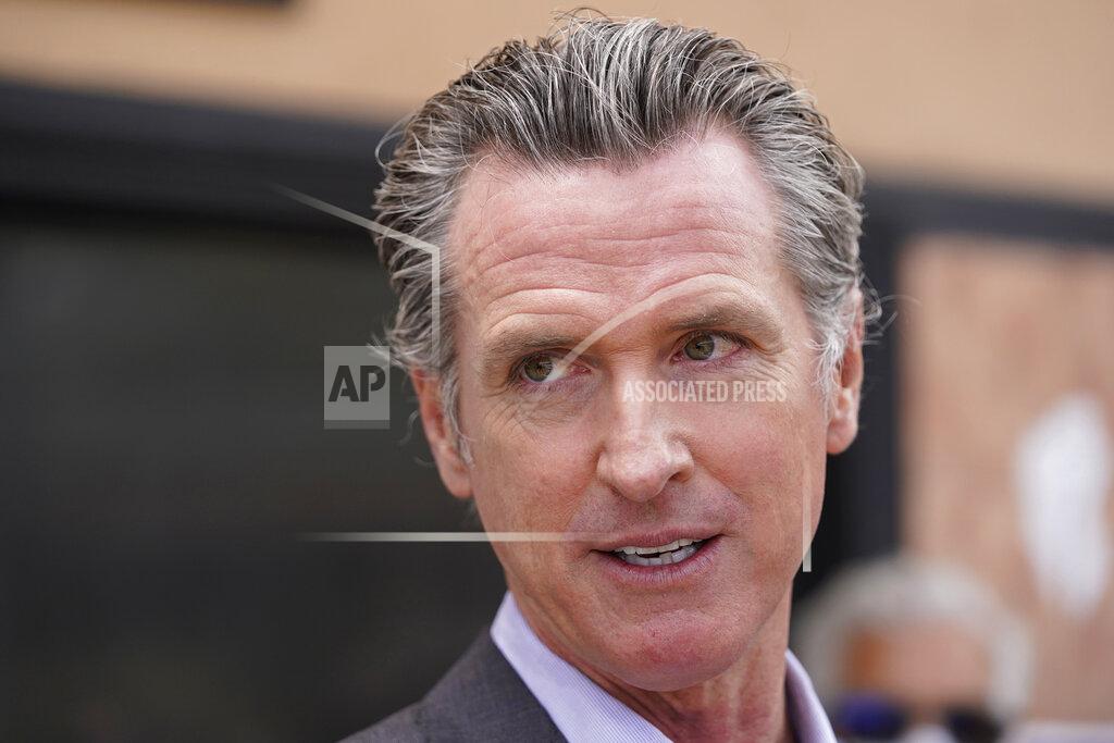 Eric Risberg California Gov. Gavin Newsom listens to questions during a news conference in San Francisco, on June 3, 2021. It will cost California counties an estimated $215 million to stage an expected recall election this year that could oust Newsom from office. (AP Photo/Eric Risberg)