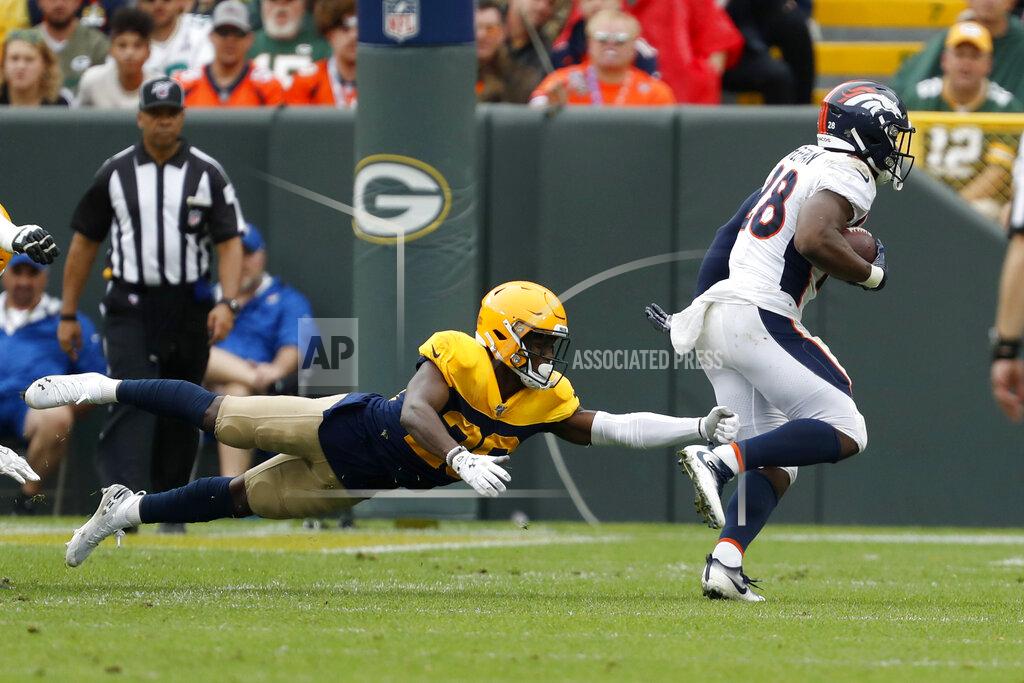 Matt Ludtke Denver Broncos running back Royce Freeman, right, runs past Green Bay Packers defensive back Darnell Savage during the first half of an NFL football game Sunday, Sept. 22, 2019, in Green Bay, Wis. (AP Photo/Matt Ludtke)