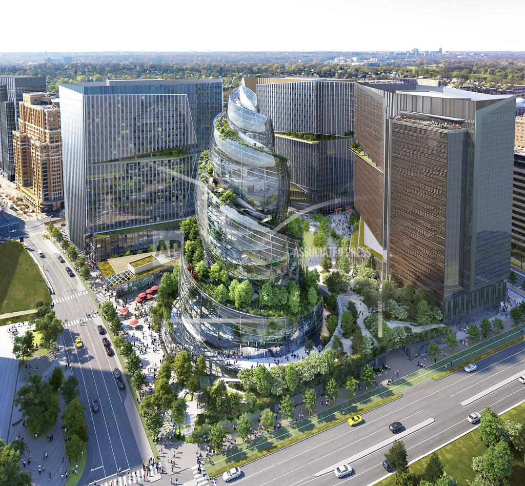 FILE - This artist rendering provided by Amazon shows the next phase of the company's headquarters redevelopment to be built in Arlington, Va. The plans released Tuesday, Feb. 2, 2021, features a 350-foot helix-shaped office tower that can be climbed from the outside like a mountain hike. Amazon is making its first foray into providing health care services, announcing Wednesday, March 17, 2021, that it will be offering its Amazon Care telemedicine program to employers nationwide. (NBBJ/Amazon via AP, File)