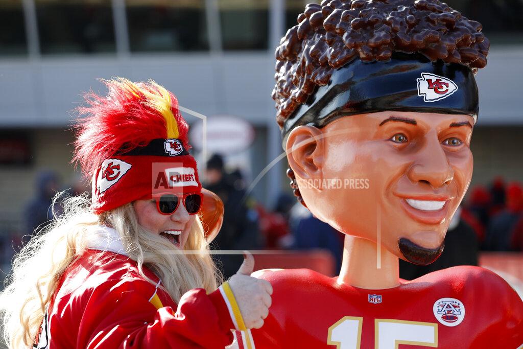 Charlie Neibergall A Kansas City Chiefs fan has a picture taken outside Arrowhead Stadium before the NFL AFC Championship football game against the Tennessee Titans Sunday, Jan. 19, 2020, in Kansas City, MO. (AP Photo/Charlie Neibergall)