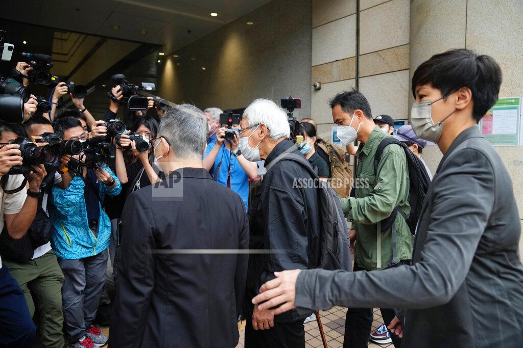 Kin Cheung From right, Hong Kong singer Denise Ho, Hong Kong scholar Hui Po-keung, Catholic Cardinal Joseph Zen and barrister Margaret Ng and arrive for an appearance at a court in Hong Kong as they were charged in relation to their past fundraising for activists, Tuesday, May 24, 2022. (AP Photo/Kin Cheung)