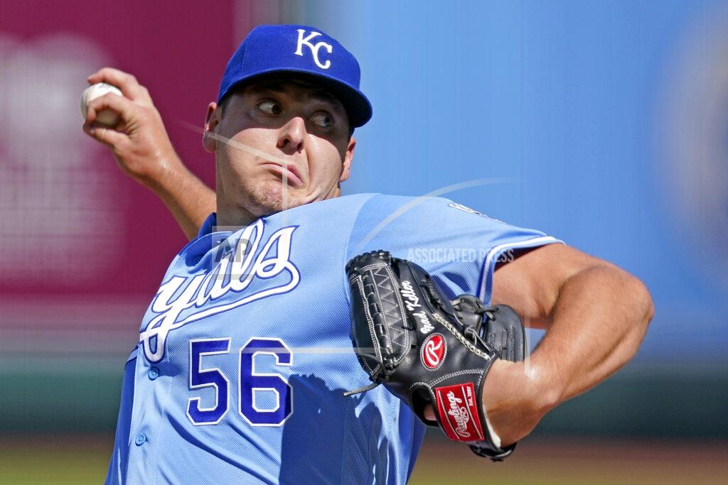 Charlie Riedel Kansas City Royals starting pitcher Brad Keller throws during the first inning of game one of a baseball doubleheader against the Cincinnati Reds Wednesday, Aug. 19, 2020, in Kansas City, Mo. (AP Photo/Charlie Riedel)