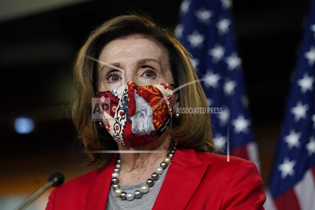 Jacquelyn Martin House Speaker Nancy Pelosi of Calif., speaks to the media, Wednesday Dec. 30, 2020, on Capitol Hill in Washington. (AP Photo/Jacquelyn Martin)