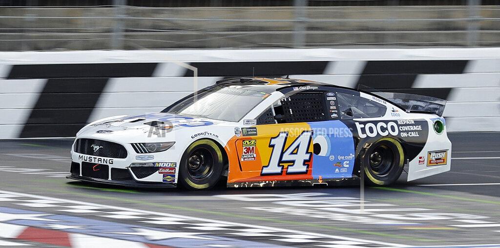 Chuck Burton Clint Bowyer drives during qualifying for Saturday's NASCAR All-Star auto race at Charlotte Motor Speedway in Concord, N.C., Friday, May 17, 2019. Bowyer won the pole position for the race. (AP Photo/Chuck Burton)