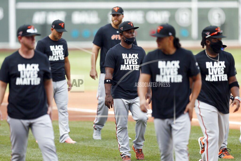 Michael Dwyer Baltimore Orioles players warm up in Black Lives Matter shirts before an opening day baseball game against the Boston Red Sox at Fenway Park, Friday, July 24, 2020, in Boston. (AP Photo/Michael Dwyer)
