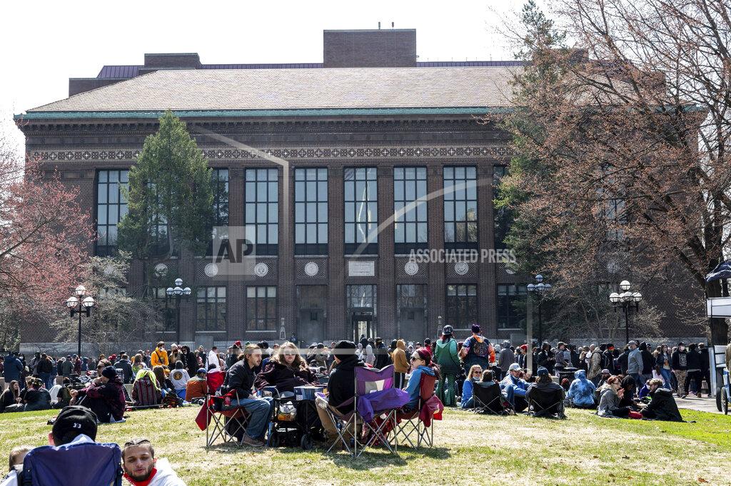 Jacob Hamilton Smoke wafts over at a Hash Bash event at the University of Michigan in Ann Arbor, Mich., Saturday, April 3, 2021.( Jacob Hamilton/Ann Arbor News via AP)