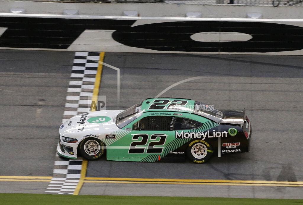 Terry Renna Austin Cindric crosses the finish line to win the NASCAR Xfinity Series auto race at Daytona International Speedway, Saturday, Aug. 15, 2020, in Daytona Beach, Fla. (AP Photo/Terry Renna)
