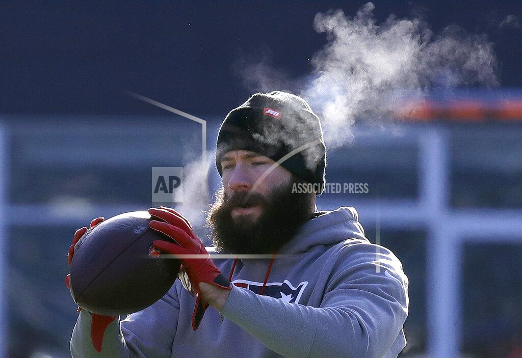 Charles Krupa New England Patriots wide receiver Julian Edelman warms up before an NFL divisional playoff football game against the Los Angeles Chargers, Sunday, Jan. 13, 2019, in Foxborough, Mass. (AP Photo/Charles Krupa)