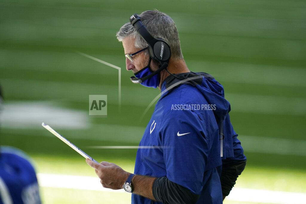 Michael Conroy Indianapolis Colts head coach Frank Reich looks at his play chart during the second half of an NFL football game against the Minnesota Vikings, Sunday, Sept. 20, 2020, in Indianapolis. (AP Photo/Michael Conroy)