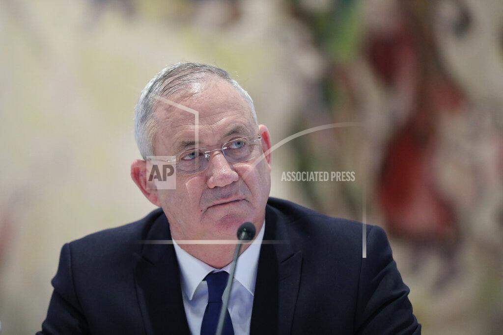 FILE - In this May 24, 2020 file photo, Israeli Defense Minister Benny Gantz attends the first Cabinet meeting of the new government at the Chagall Hall in the Knesset, the Israeli Parliament in Jerusalem, Israel. Gantz, Prime Minister Benjamin Netanyahu’s chief governing partner on Tuesday, Dec. 1 said he would vote in favor of a proposal to dissolve their troubled coalition, accusing the Israeli leader of repeatedly breaking his promises and pushing Israel closer to its fourth election in two years. (Abir Sultan/Pool Photo via AP, File)