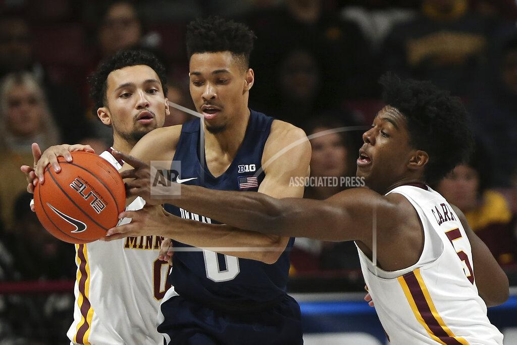 Stacy Bengs Penn State's Myreon Jones protects the ball against Minnesota's Payton Willis, left, and Marcus Carr, right, during an NCAA basketball game Wednesday, Jan. 15, 2020, in Minneapolis. (AP Photo/Stacy Bengs)