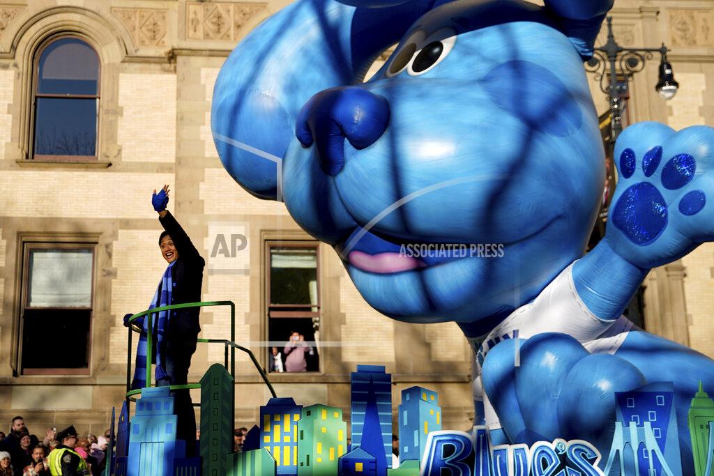 Julia Nikhinson Host of Blue's Clues Joshua Dela Cruz waves from the Blue's Clues & You! float as it makes its way down Central Park West during the Macy's Thanksgiving Day Parade, Thursday, Nov. 24, 2022, in New York. (AP Photo/Julia Nikhinson)
